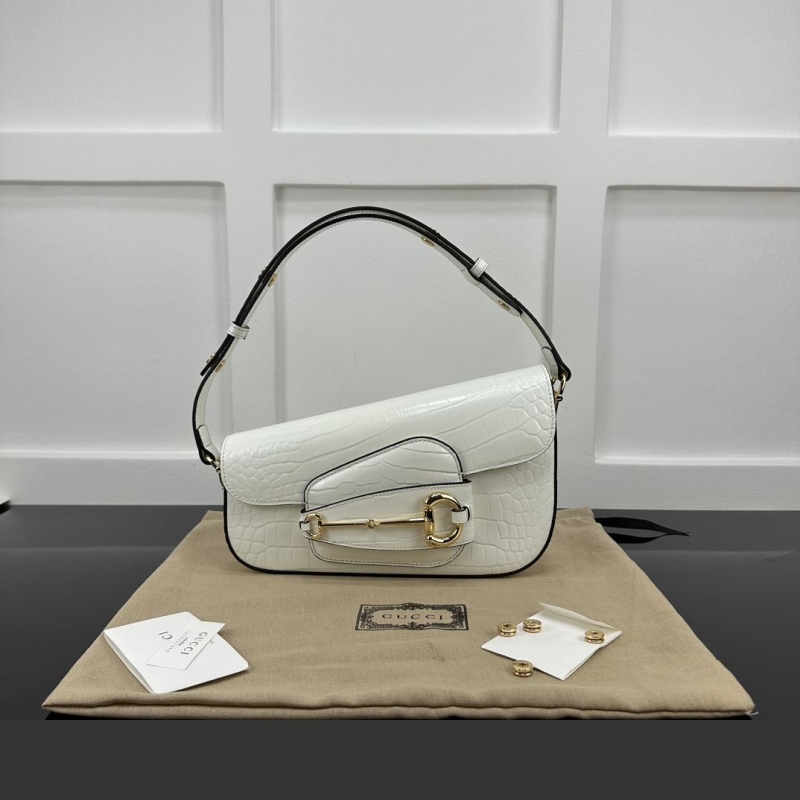 G*u*i top handle bags